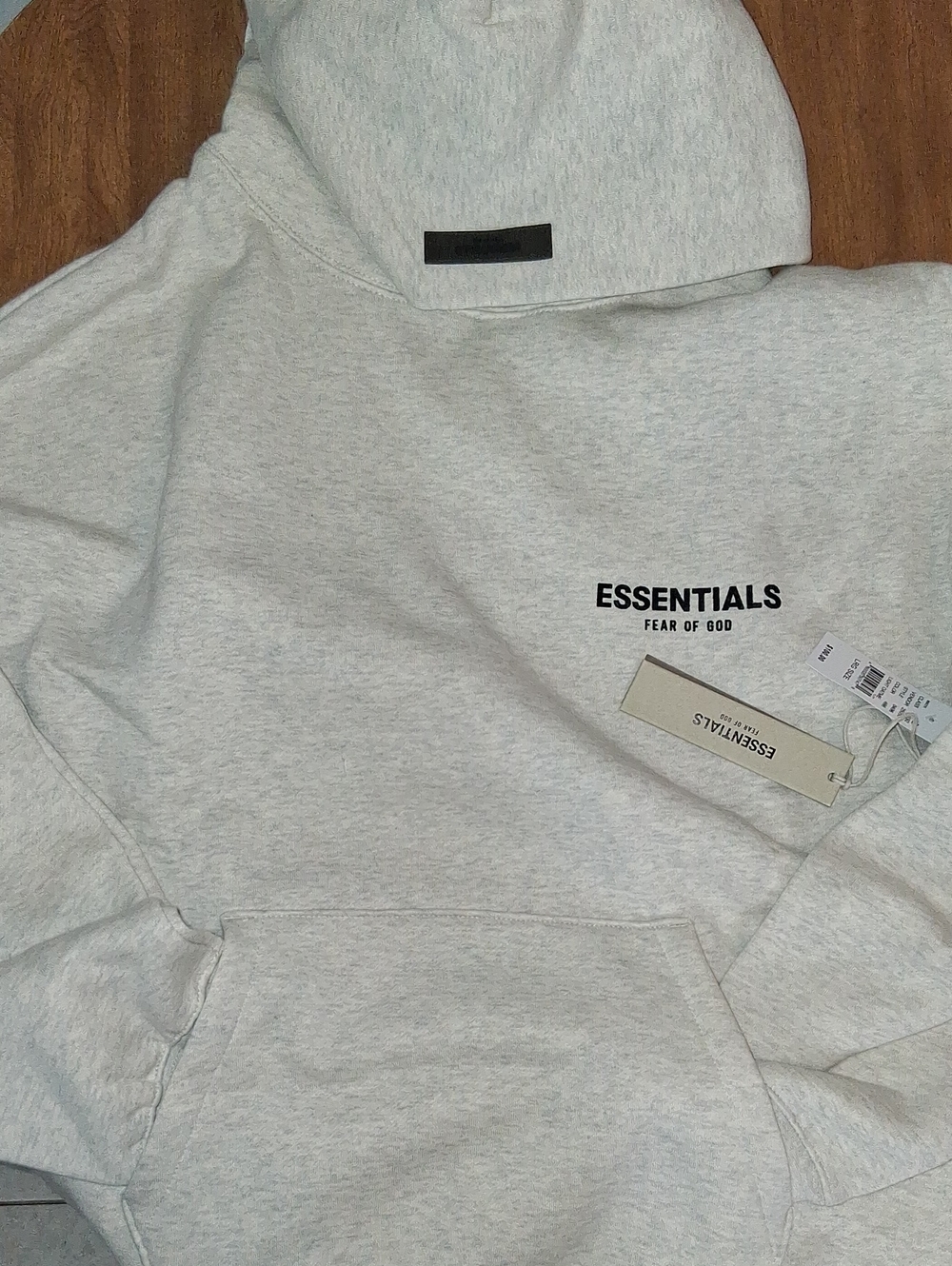 Fear of God ESSENTIALS Light Gray Hoodie with Black Logo